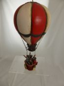 A Terracotta Flying Balloon and Basket.