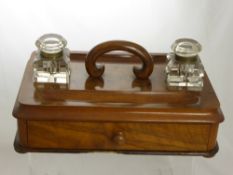 An Antique Walnut and Mahogany Gentleman's Travelling Ink Well Stand, the ink well having drawer