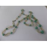 Circa 1920's Turquoise and Seed Pearl Graduated Necklace, the necklace on an 18 ct white gold and