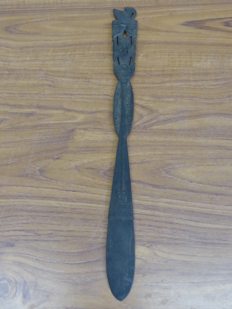 An Antique Polynesian Dagger, with decorative carvings to the handle and blade head, approx 52 cms