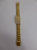 A Gentleman's 18ct White, Yellow Gold and Diamond Bracelet set with 63 diamonds, the bracelet having