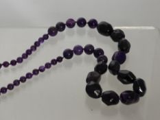 A Graduated Amethyst Bead Necklace, length 78cms.