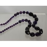 A Graduated Amethyst Bead Necklace, length 78cms.