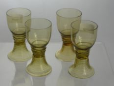 Antique Continental Hand Blown Hock Glasses, the ten antique amber glasses having beaded snake