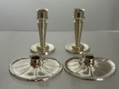 A Pair of Silver Metal Danish Miniature Candle Sticks, together with a pair of candle holders in the