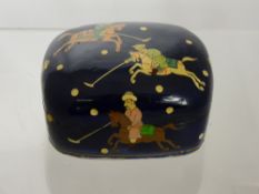 An Antique Persian Paper Mache Trinket Box, decorated with figures playing chowgan (polo).