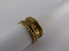 A Georgian 18 ct Gold and Black Enamel Mourning Ring, the outer band inscribed "In Memory of" and