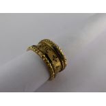 A Georgian 18 ct Gold and Black Enamel Mourning Ring, the outer band inscribed "In Memory of" and