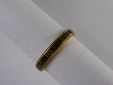 A Georgian High Carat Gold and Black Enamel Mourning Ring, inscribed Tho Cheetham ob 14 Sep 1785