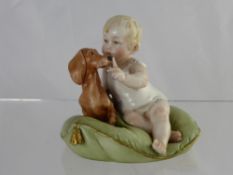 A Capo di Monte Figure of a Young Girl with a Dachshund.