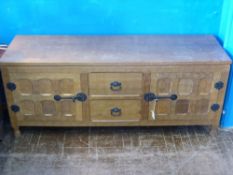 A Sid Pollard Oak Low Chest Cabinet, the cabinet having an adzed top benefiting from two panelled