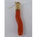 A Lady's Antique Gold Capped Coral Pendant, approx 6 cms Provenance: From a collection belonging