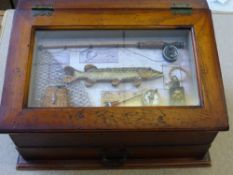 A Wooden Miniature Chest, the chest having a pike fly fishing display to top with single drawer