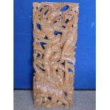 A Hand Carved Indonesian Panel carved with deity and elephants 19 x 35 cms.