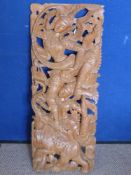A Hand Carved Indonesian Panel carved with deity and elephants 19 x 35 cms.