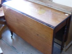 An Antique Mahogany Drop Leaf Table on turned legs, approx 137 x 106 x 73 cms.