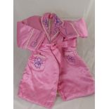 A Vintage Child's Quilted Dressing Gown, together with a model of the Royal State Coach by