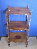 A Rose Wood Three Tier Whatnot, the whatnot having scalloped shaped sides with turned support and