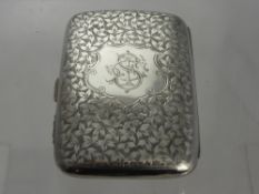 A Solid Silver Cigar Case, the case having a gilded interior with decorative leaf design to the