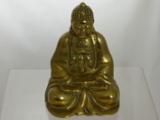 A Brass Figure of Buddha, the figure seated in the lotus positiion and having floral engraved neck