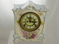 A Victorian Hand Painted Mantle Clock, the clock decorated with flowers and stamped Royal Bonn, La