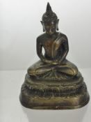 A 19th Century Bronze Figure of Buddha, seated on a lotus blossom in a contemplative posture.