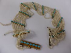 An Antique Turquoise and Seed Pearl Eight Strand Collar Necklace, approx 33 cms, (waf).