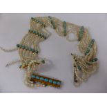 An Antique Turquoise and Seed Pearl Eight Strand Collar Necklace, approx 33 cms, (waf).