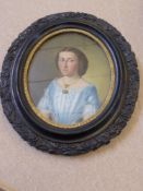 A 19th Century German School Oil on Panel Miniature oval portrait of Marie Mohn inscribed verso,