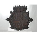 A Wooden Antique Armorial depicting carved Coat of Arms with a crown atop, inscribed on reverse "A