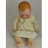 An Antique Armand & Marseilles Porcelain Headed Doll, the doll's head A.M. Germany 351/8K and having