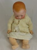 An Antique Armand & Marseilles Porcelain Headed Doll, the doll's head A.M. Germany 351/8K and having