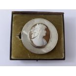 An Antique Silver and Shell Cameo Brooch, depicting a classical profile with part box Mackay