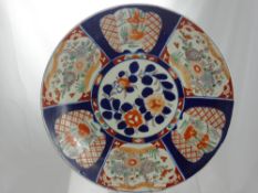 A Japanese 20th Century Imari Charger, approx 40 cms diameter, with decorative floral design.