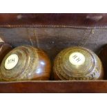 Two Sets of Antique Bowling Balls together with a white throwing ball F.H Ayres, London set in