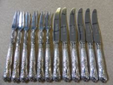 Six Silver Handled Hors D' Oeuvre Knives and Forks, Sheffield hallmark, dated 1971/2