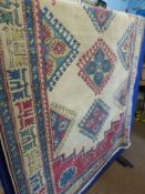 A Vintage Turkish Woolen Carpet, with cream ground and central guls, 113 x 200 cms