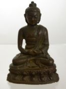 A 19th Century Bronze of Buddha, seated on a lotus base, in a contemplative posture, approx 10 cms