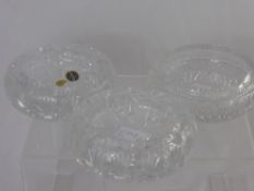 A Pair, plus one other Bohemian cut crystal heavy bowls, one with paper labels, 15.5 cms dia.