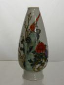 A Chinese Famille Rose Style Vase, the hand painted vase depicting an exotic bird and