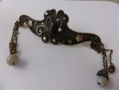 An Antique Continental Silver Filigree and Enamel Semi-Precious Stone Cloak Clasp, the wing form