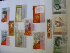 A wide range of all-world stamps in stockbooks together with an album of first day covers etc.,