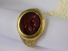 A Circa 18th Century High Carat Gentleman's Gold and Cornelian Intaglio Seal Ring, the ring having