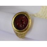 A Circa 18th Century High Carat Gentleman's Gold and Cornelian Intaglio Seal Ring, the ring having