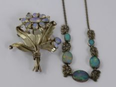 A Silver and Moonstone Style Brooch, together with a vintage silver metal and synthetic opal style