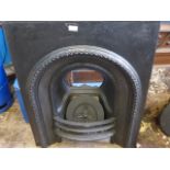 A Victorian Style Cast Iron Fire Basket and Surround