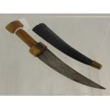 An 18th Century Persian 'Khanja' Dagger, The hilt is carved from dark brown horn. The blade measures