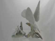 A Lladro Figure of a Fan Tail Dove, approx 29 cms high. together with a Lladro Figure of Three Ducks
