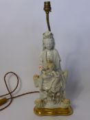 An Antique Blanc de Chine Table Lamp Base, in the form of Guayin with a smaller figure in her lap,