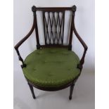Two Chairs with Green Upholstery, the first an armchair with studded cushion on circular seat and